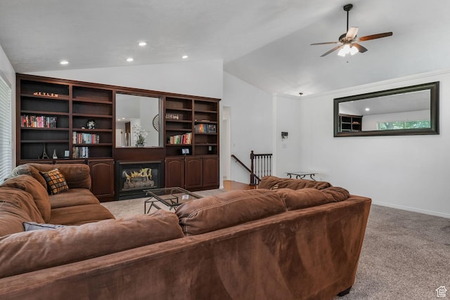 5077 W 11000 N, Highland, UT 84003 - living area featuring vaulted ceiling, light carpet, a ceiling fan, recessed lighting, and a glass covered fireplace