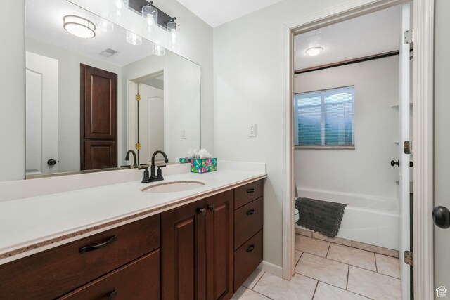 5077 W 11000 N, Highland, UT 84003 - full bath with vanity, a bath, and tile patterned floors