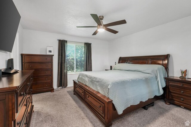 5077 W 11000 N, Highland, UT 84003 - bedroom featuring light colored carpet and ceiling fan