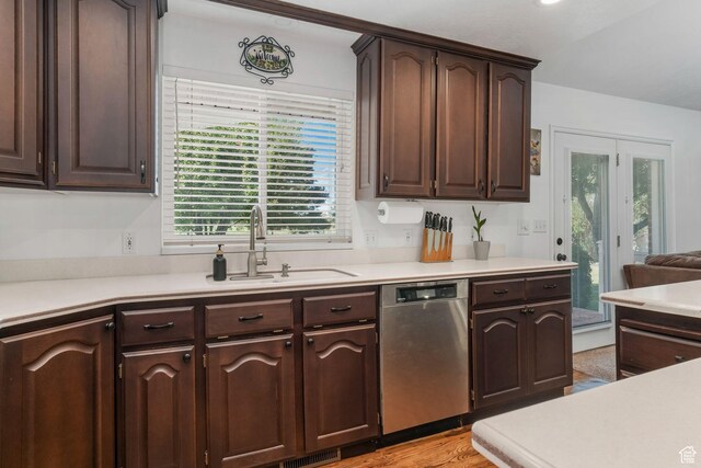 5077 W 11000 N, Highland, UT 84003 - kitchen with stainless steel dishwasher, dark brown cabinetry, and light countertops