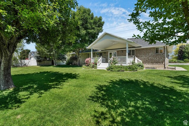 5077 W 11000 N, Highland, UT 84003 - view of front of property with covered porch and brick siding