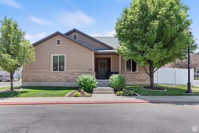 1025 N Apple Seed Ln, Santaquin, UT 84655 - view of front facade with brick siding and stucco siding