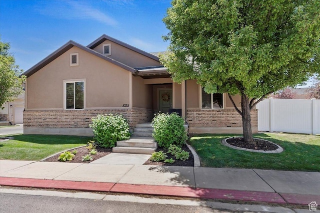 1025 N Apple Seed Ln, Santaquin, UT 84655 - view of front of property with brick siding and stucco siding