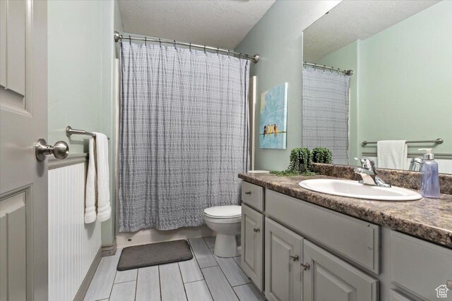 1025 N Apple Seed Ln, Santaquin, UT 84655 - bathroom with vanity and a textured ceiling