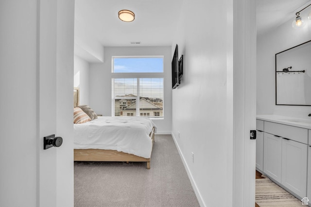 5930 Cardiff Pass Rd, Mountain Green, UT 84050 - bedroom with baseboards and light colored carpet