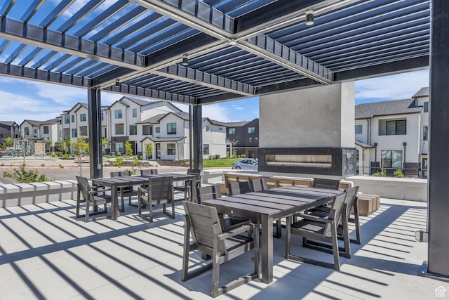 5930 Cardiff Pass Rd, Mountain Green, UT 84050 - view of patio featuring a residential view, outdoor dining space, and a pergola