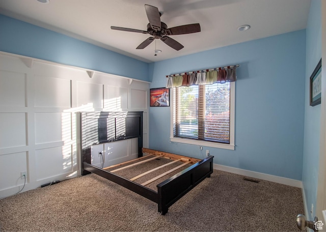 5818 N Cambridge Dr E, Mountain Green, UT 84050 - carpeted bedroom with baseboards and ceiling fan