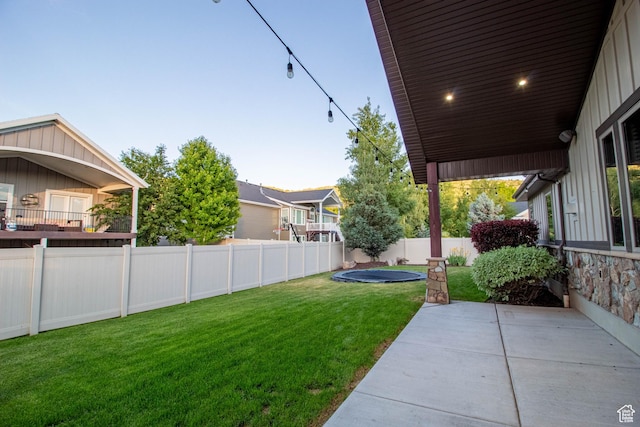 5818 N Cambridge Dr E, Mountain Green, UT 84050 - fenced backyard featuring a patio area