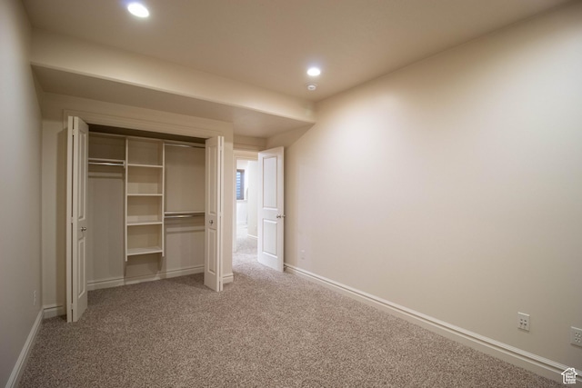 5818 N Cambridge Dr E, Mountain Green, UT 84050 - unfurnished bedroom with light colored carpet, a closet, and recessed lighting