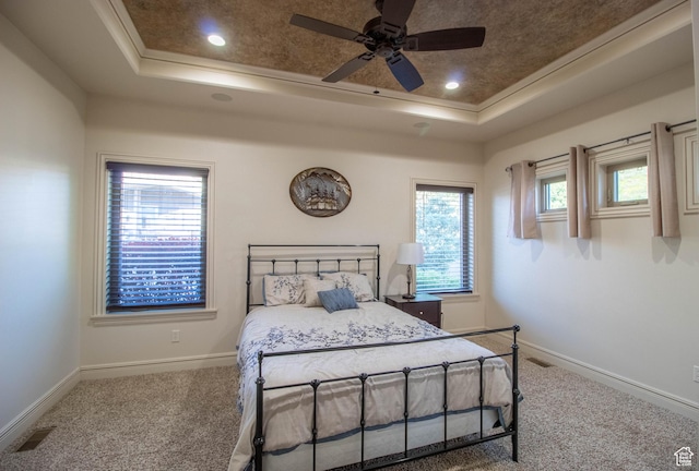5818 N Cambridge Dr E, Mountain Green, UT 84050 - bedroom featuring a tray ceiling, carpet flooring, crown molding, recessed lighting, and a ceiling fan
