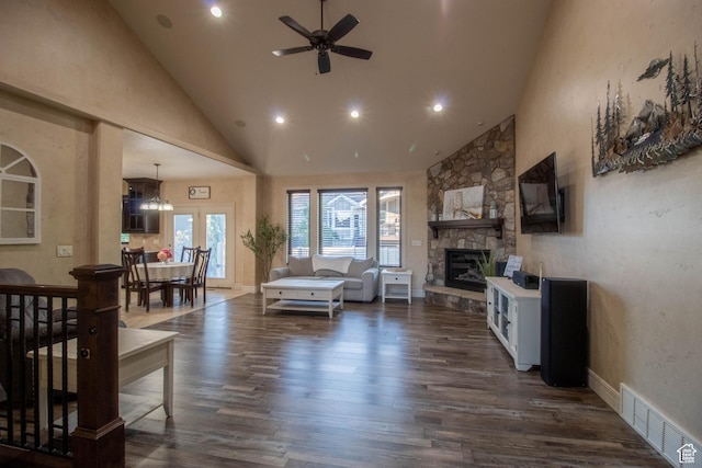 5818 N Cambridge Dr E, Mountain Green, UT 84050 - living room featuring high vaulted ceiling, dark wood-type flooring, a ceiling fan, recessed lighting, and a fireplace