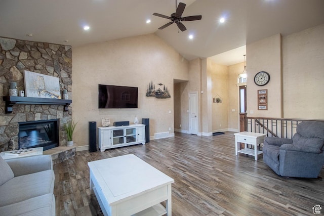 5818 N Cambridge Dr E, Mountain Green, UT 84050 - living room with high vaulted ceiling, a ceiling fan, wood finished floors, a fireplace, and recessed lighting