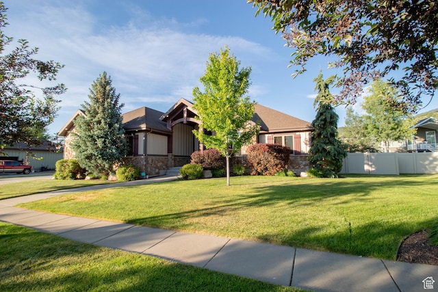 5818 N Cambridge Dr E, Mountain Green, UT 84050 - view of front facade featuring stone siding and board and batten siding