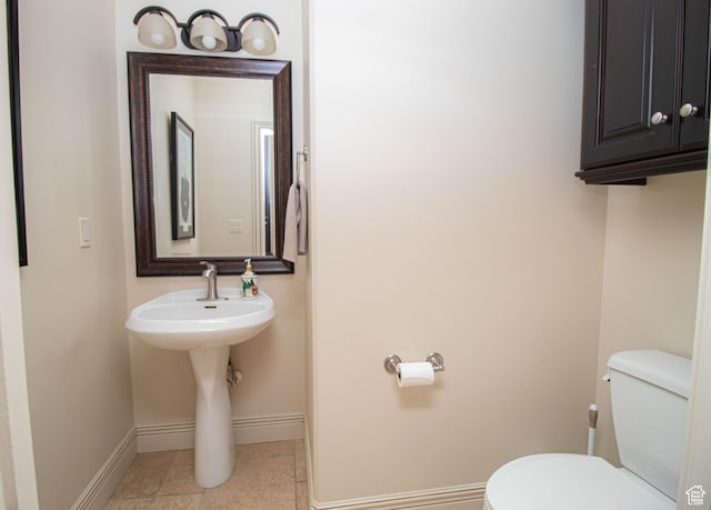 5818 N Cambridge Dr E, Mountain Green, UT 84050 - half bath with baseboards and toilet