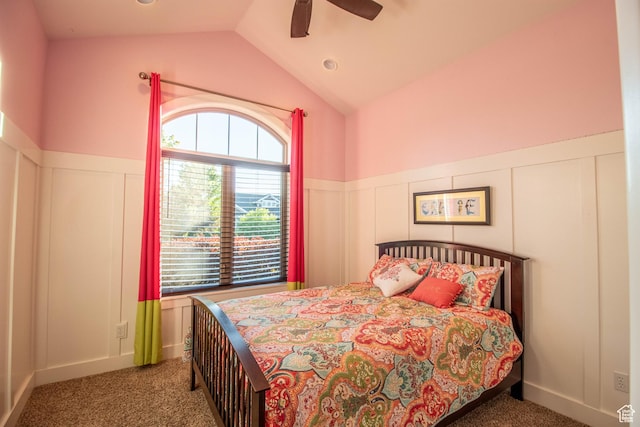 5818 N Cambridge Dr E, Mountain Green, UT 84050 - carpeted bedroom featuring a decorative wall, lofted ceiling, a wainscoted wall, and ceiling fan