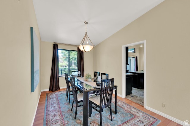 1623 E Spring Run Dr, Holladay, UT 84117 - dining space with light wood-style floors and lofted ceiling