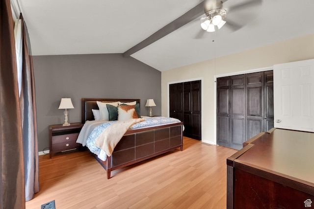 1623 E Spring Run Dr, Holladay, UT 84117 - bedroom with light wood-style flooring, two closets, and ceiling fan