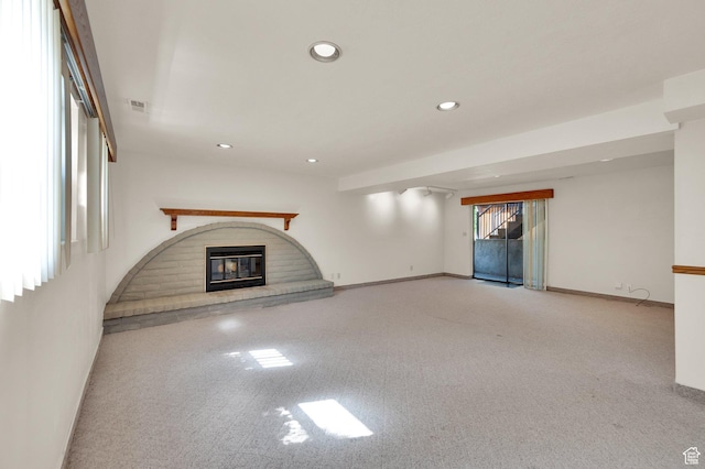1623 E Spring Run Dr, Holladay, UT 84117 - unfurnished living room featuring a fireplace, recessed lighting, and carpet flooring