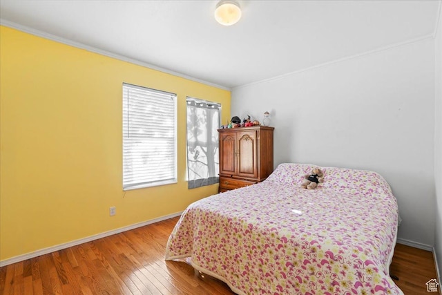 868 E Valley View Dr N, Tooele, UT 84074 - bedroom with ornamental molding and wood finished floors