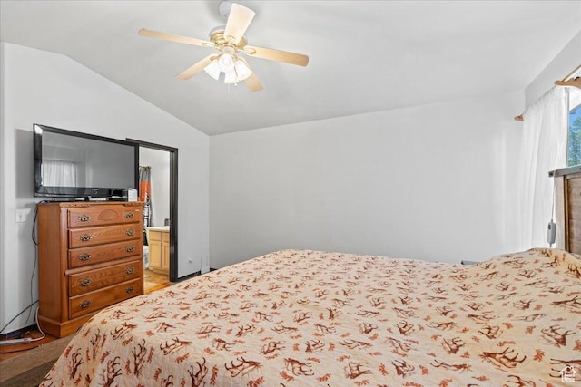 868 E Valley View Dr N, Tooele, UT 84074 - bedroom with vaulted ceiling, ceiling fan, light wood-type flooring, and ensuite bathroom