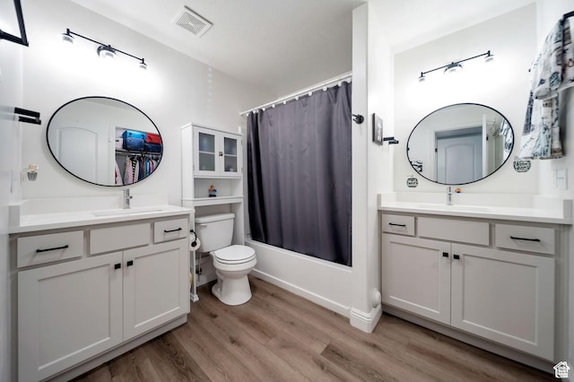 317 S 1000 W Unit 204, Pleasant Grove, UT 84062 - bathroom featuring wood finished floors, vanity, and shower / tub combo