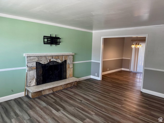7026 S Wood Green Rd, West Jordan, UT 84084 - unfurnished living room featuring a chandelier, crown molding, a stone fireplace, and wood finished floors