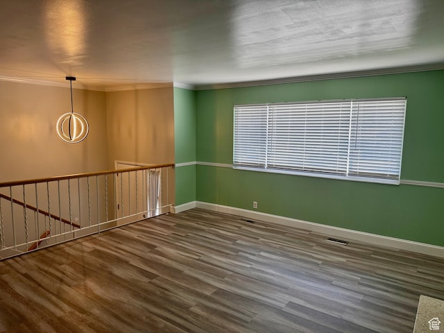 7026 S Wood Green Rd, West Jordan, UT 84084 - unfurnished room featuring wood finished floors and crown molding