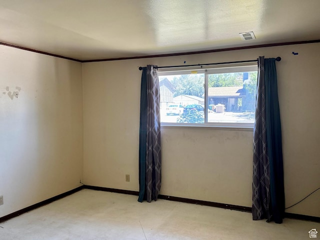 7026 S Wood Green Rd, West Jordan, UT 84084 - spare room featuring light colored carpet and ornamental molding