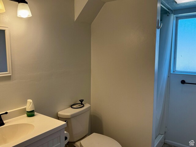 7026 S Wood Green Rd, West Jordan, UT 84084 - bathroom featuring vanity and a shower with curtain