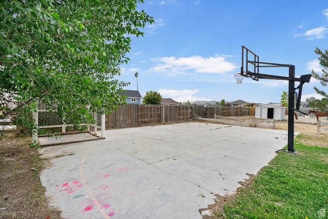 4212 N Majors St E, Eagle Mountain, UT 84005 - view of patio / terrace with a shed and basketball hoop