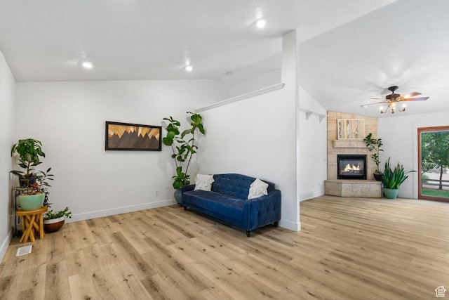 4212 N Majors St E, Eagle Mountain, UT 84005 - sitting room with vaulted ceiling, wood finished floors, ceiling fan, recessed lighting, and a tile fireplace