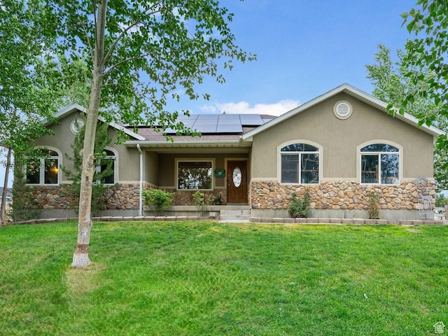 4212 N Majors St E, Eagle Mountain, UT 84005 - ranch-style home featuring stone siding, stucco siding, roof mounted solar panels, and a front yard