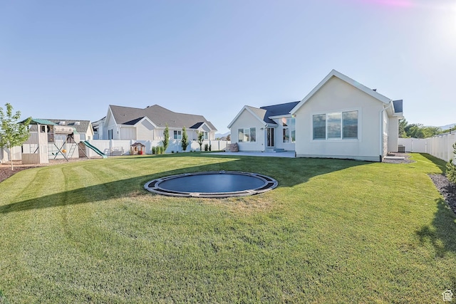 10243 S Dial Ct, South Jordan, UT 84009 - fenced backyard featuring a playground and a residential view