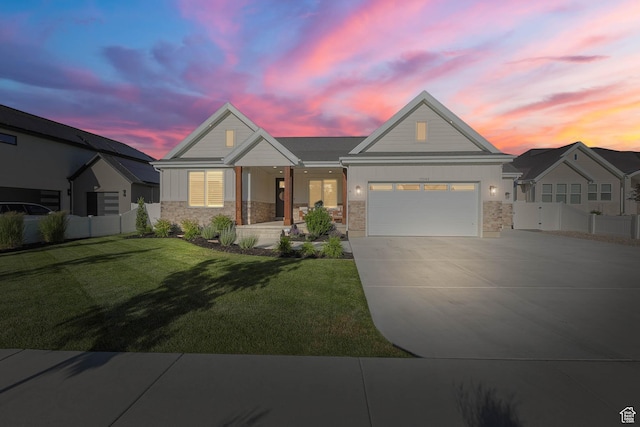 10243 S Dial Ct, South Jordan, UT 84009 - ranch-style home featuring stone siding, driveway, an attached garage, and a porch