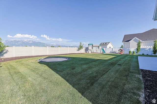 10243 S Dial Ct, South Jordan, UT 84009 - fenced backyard featuring a playground