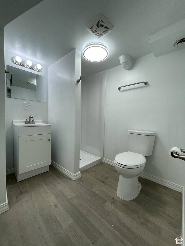 1783 N 300 W, Sunset, UT 84015 - bathroom with a stall shower, vanity, and wood finished floors