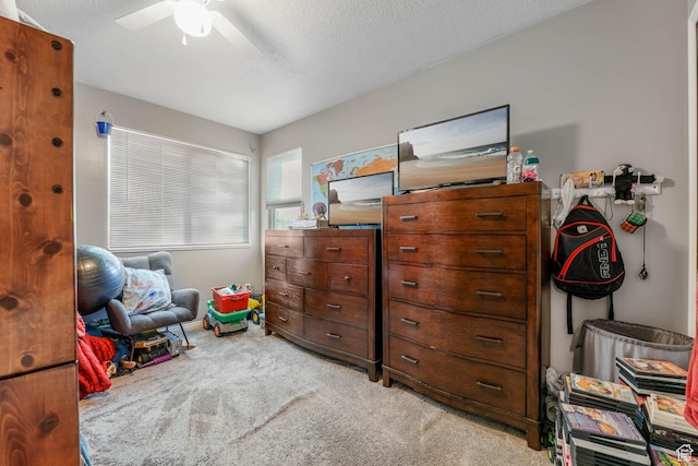 10314 S 3970 W, South Jordan, UT 84009 - bedroom featuring light carpet, a textured ceiling, and a ceiling fan