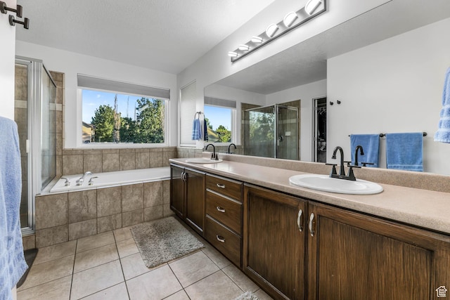 10314 S 3970 W, South Jordan, UT 84009 - full bathroom with a shower stall, tile patterned flooring, double vanity, and a garden tub
