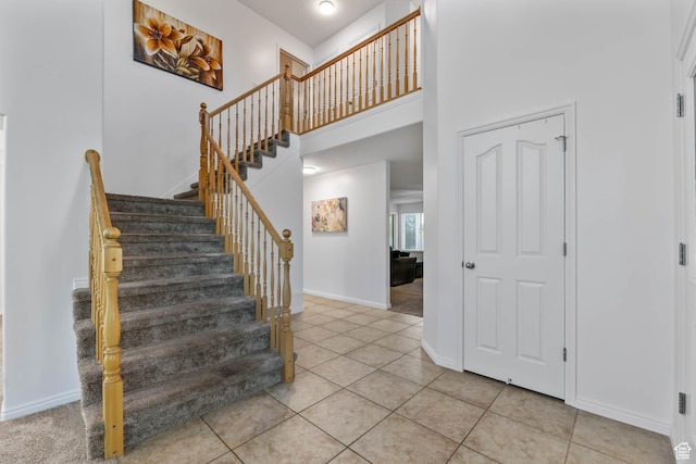 10314 S 3970 W, South Jordan, UT 84009 - stairs with a towering ceiling and tile patterned flooring