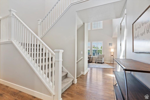 12140 S Galena Grove Way W, Draper, UT 84020 - stairs featuring wood finished floors and a high ceiling