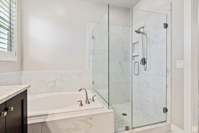 12140 S Galena Grove Way W, Draper, UT 84020 - full bathroom featuring a garden tub, a shower stall, and vanity