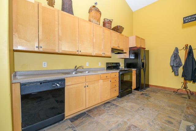 6785 N 2200 W Unit 207, Park City, UT 84098 - kitchen with black appliances, under cabinet range hood, light stone finish flooring, light brown cabinets, and high vaulted ceiling