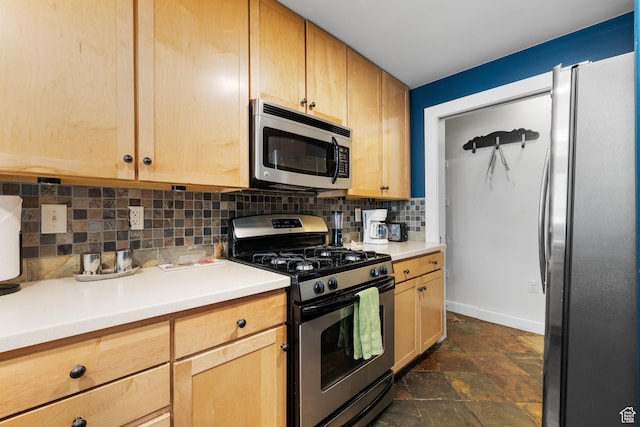6785 N 2200 W Unit 207, Park City, UT 84098 - kitchen featuring stainless steel appliances, light brown cabinets, decorative backsplash, and dark stone finish flooring
