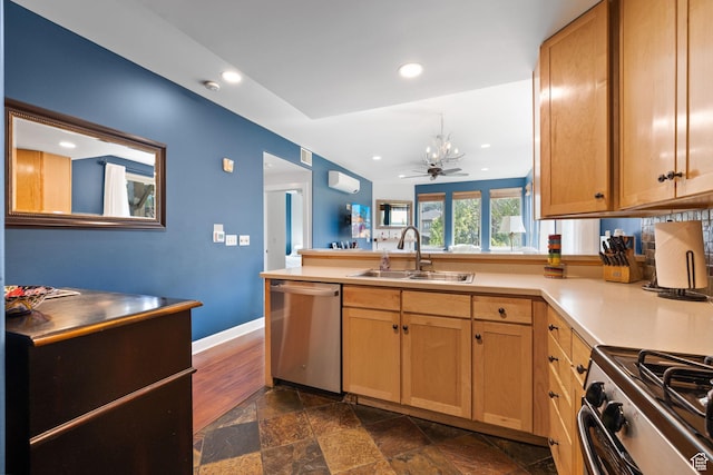 6785 N 2200 W Unit 207, Park City, UT 84098 - kitchen with stainless steel appliances, recessed lighting, a peninsula, dark stone finish floors, and an AC wall unit