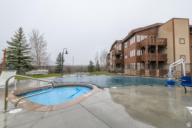 6785 N 2200 W Unit 207, Park City, UT 84098 - community pool featuring a community hot tub and a patio area