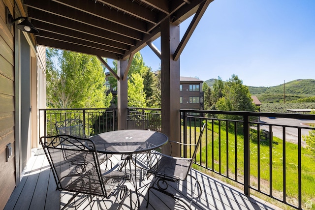 6785 N 2200 W Unit 207, Park City, UT 84098 - balcony with outdoor dining space and a mountain view