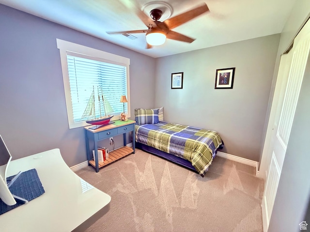12887 S Wild Mare Way, Riverton, UT 84096 - carpeted bedroom with ceiling fan and a closet