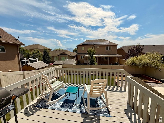 12887 S Wild Mare Way, Riverton, UT 84096 - wooden deck with a residential view and a fenced backyard