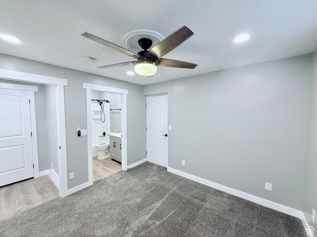 12887 S Wild Mare Way, Riverton, UT 84096 - unfurnished bedroom with carpet flooring, ensuite bathroom, and a ceiling fan