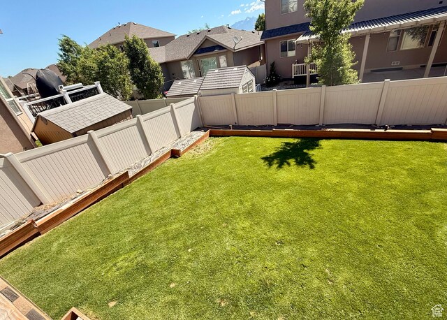 12887 S Wild Mare Way, Riverton, UT 84096 - fenced backyard featuring a residential view